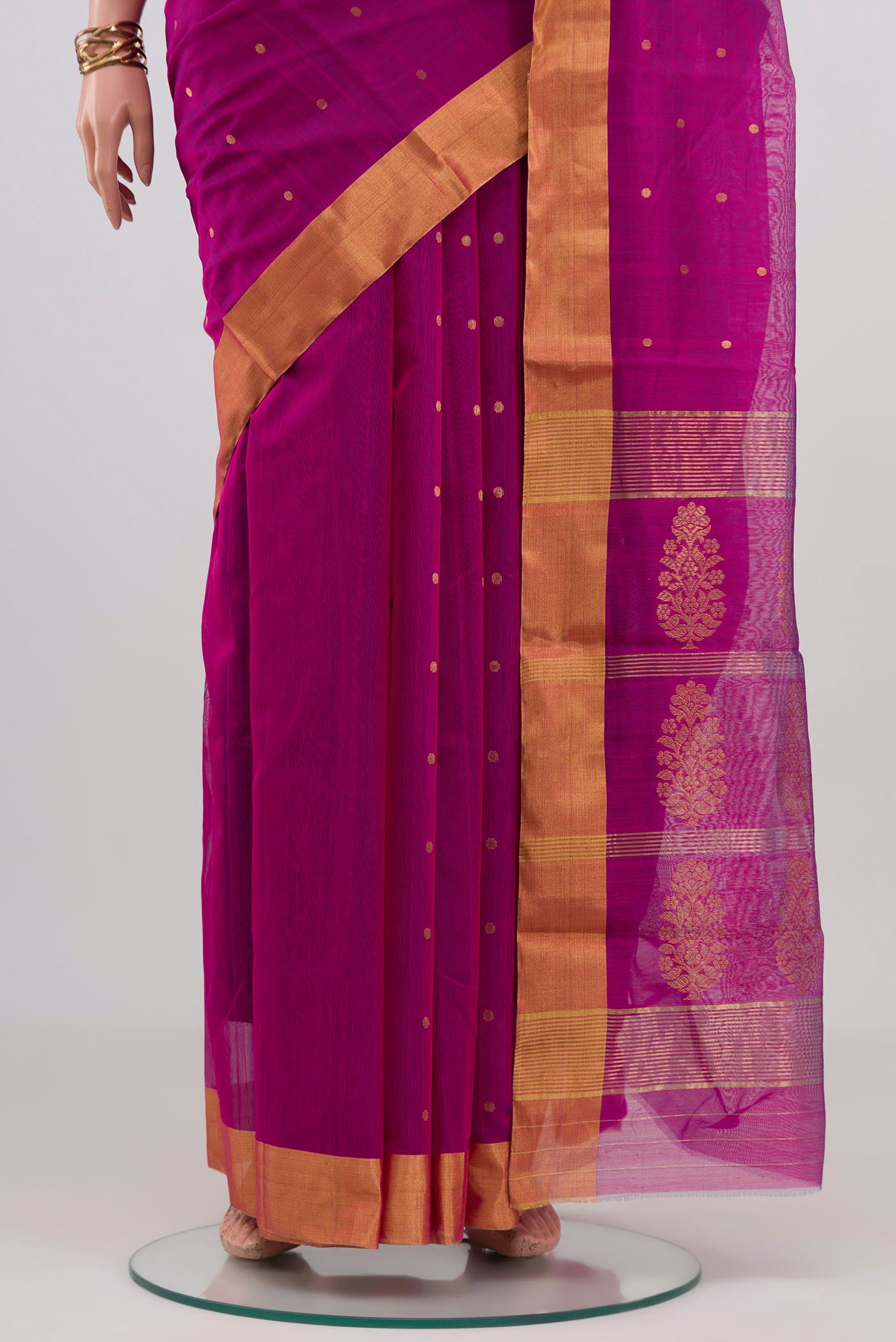 Pleats and pallu of Magenta Chanderi Silk Cotton Saree with Zari Butta on the body and Zari Border. 