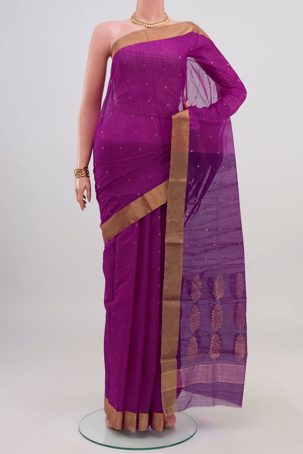 Magenta Chanderi Silk Cotton Saree with Zari Butta on the body and Zari Border.  displayed on a mannequin
