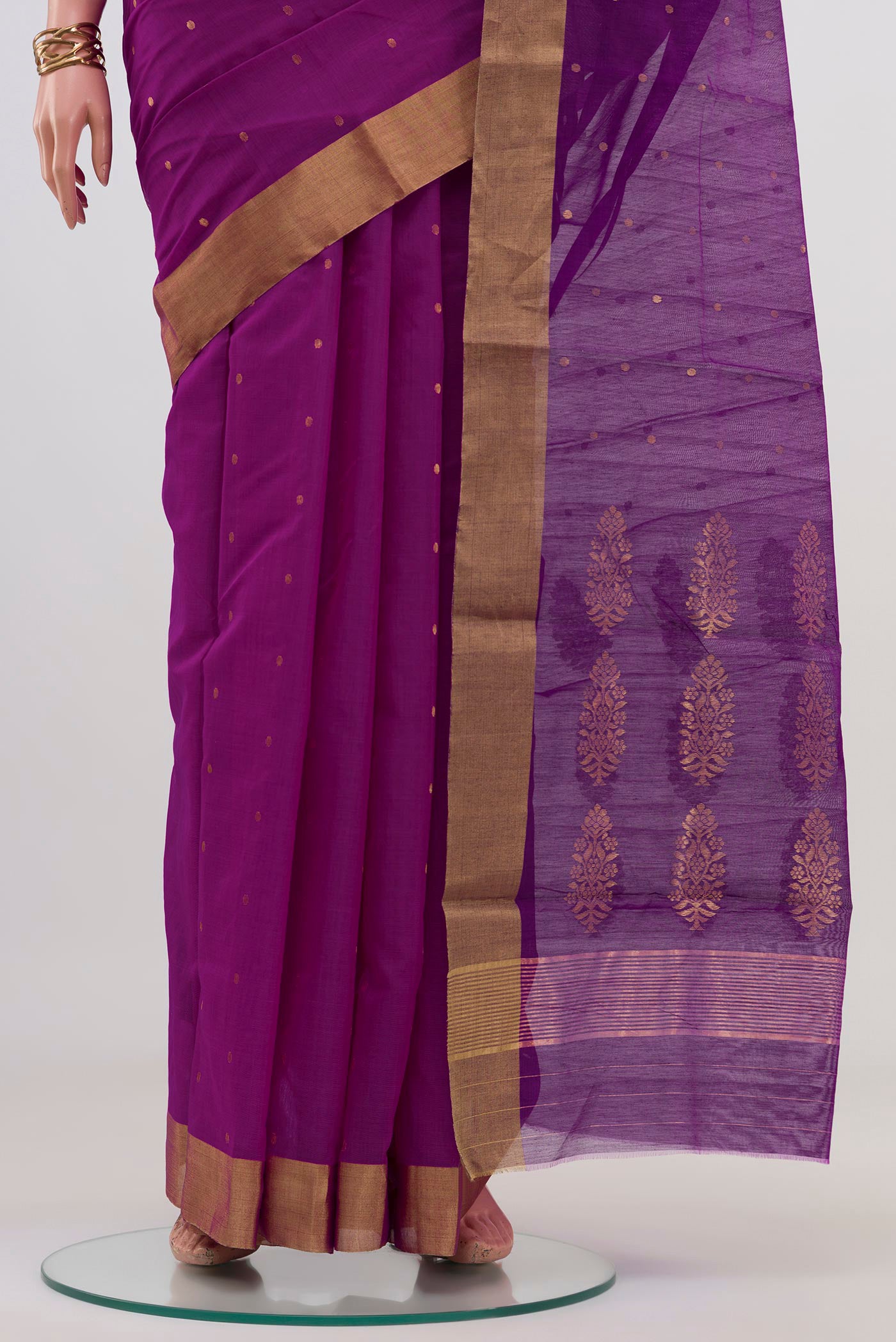 Pleats and pallu of Magenta Chanderi Silk Cotton Saree with Zari Butta on the body and Zari Border. 