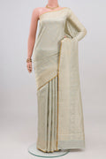 Grey Kanchipuram Silk Saree with Jacquard design on the body and Thread Border.  displayed on a mannequin