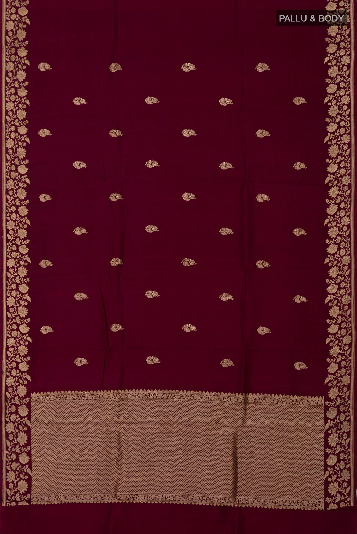 Flat view of Maroon Banarasi Katan Silk Saree with Zari Butta on the body and Fancy Border. 