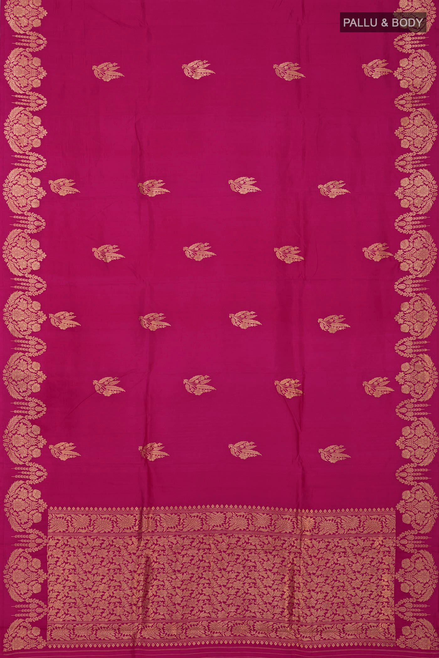 Flat view of Rani Pink Banarasi Katan Silk Saree with Zari Butta on the body and Fancy Border. 