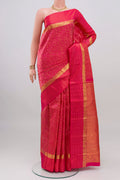 Pink Kanjivaram Silk Saree with Jacquard design on the body and Zari Border.  displayed on a mannequin