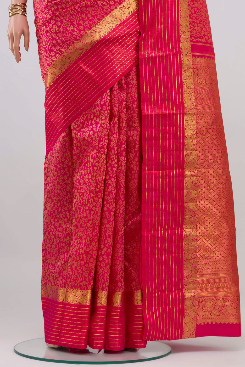Pleats and pallu of Pink Kanjivaram Silk Saree with Jacquard design on the body and Zari Border. 
