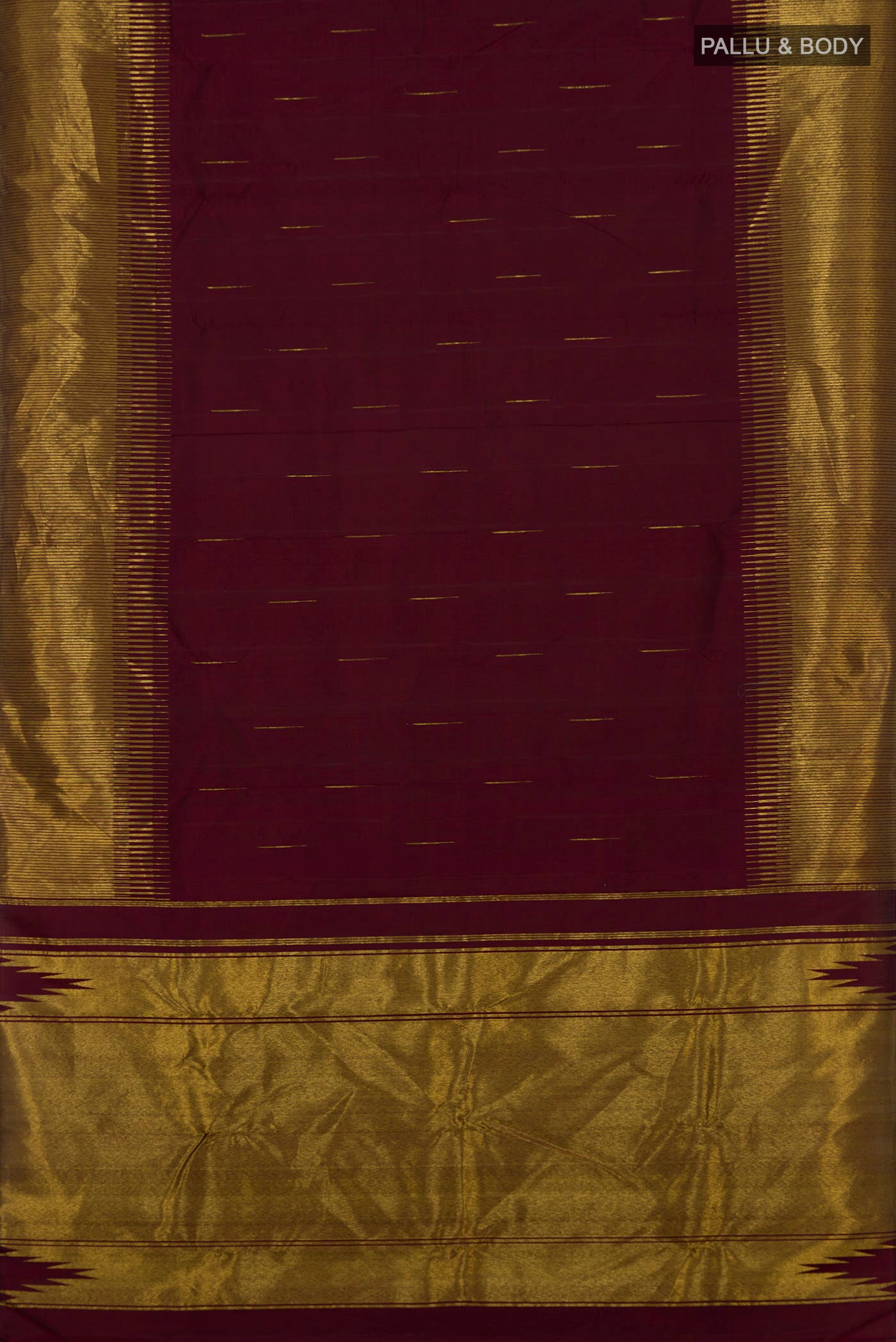 Flat view of Maroon Kanjivaram Silk Saree with Zari Butta on the body and Fancy Border. 
