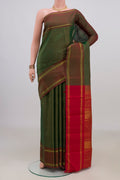 Pure Silk Green Kanchipuram Saree with Stripes on the body and Thin Zari Line.  displayed on a mannequin