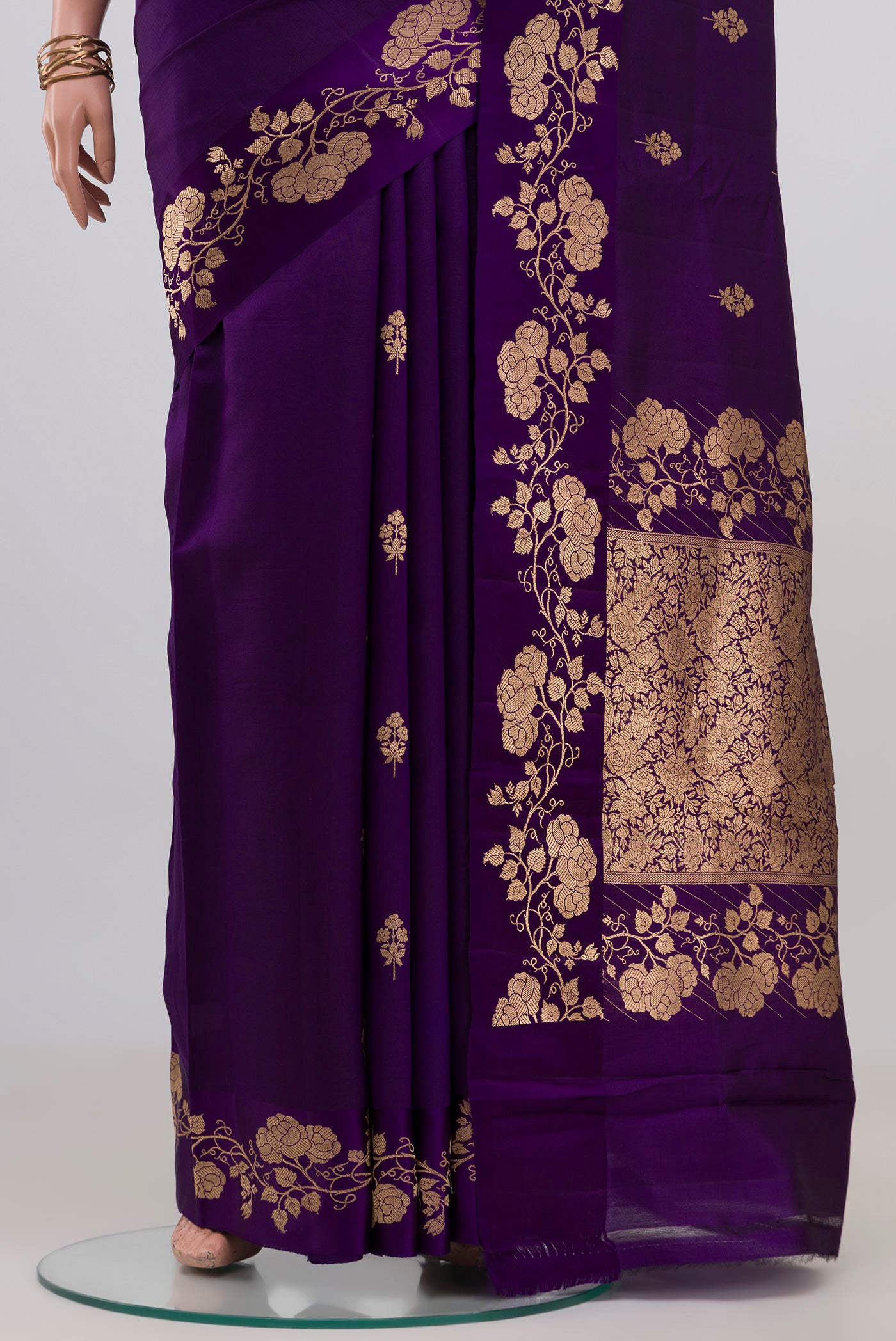Pleats and pallu of Violet Banarasi Katan Silk Saree with Zari Butta on the body and Fancy Border. 