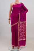 Pure Silk Magenta Banarasi Katan Saree with Thread Butta on the body and Thread Border.  displayed on a mannequin