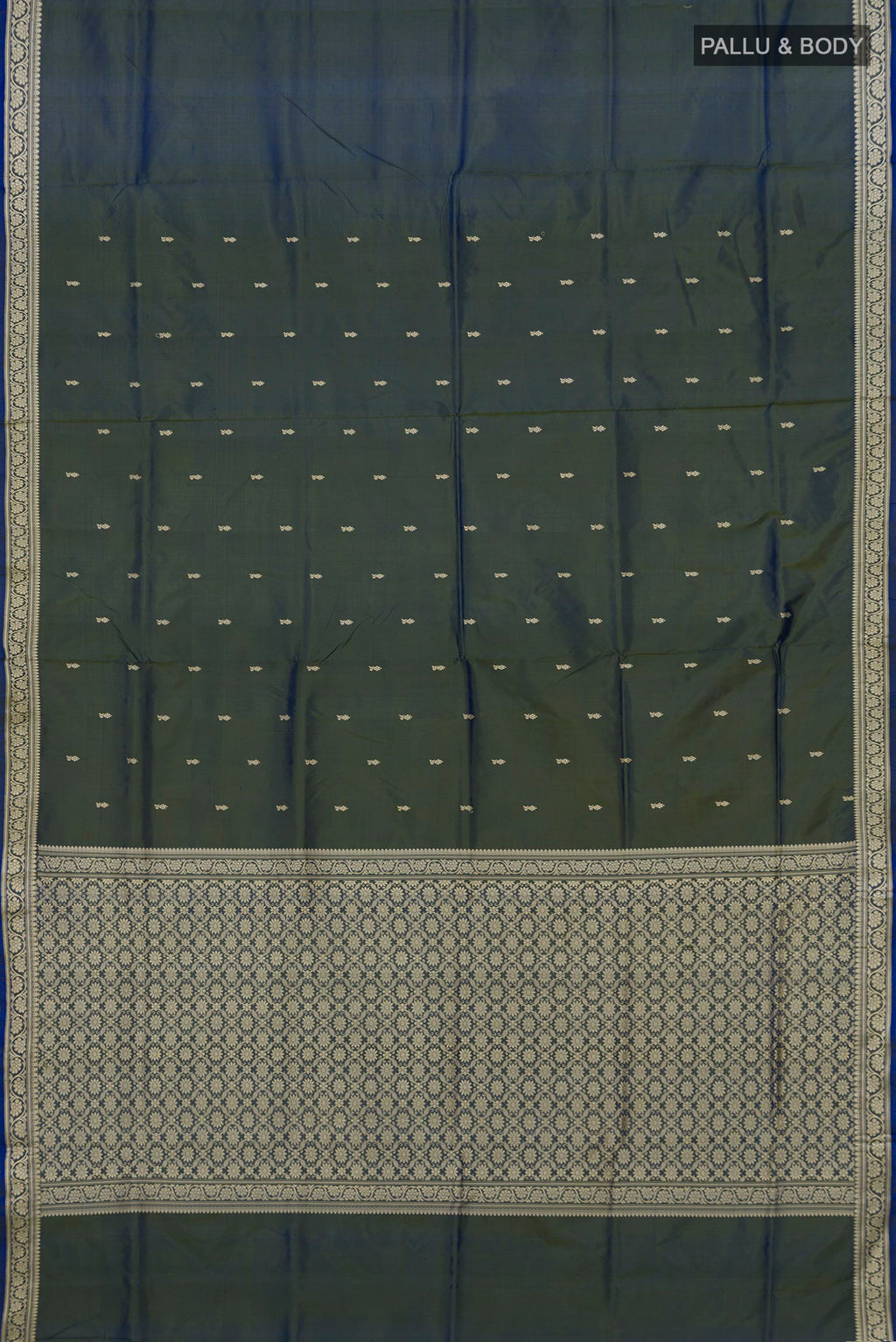 Flat view of Pure Silk Blue with Green Color Banarasi Katan Saree with Thread Butta on the body and Thread Border. 