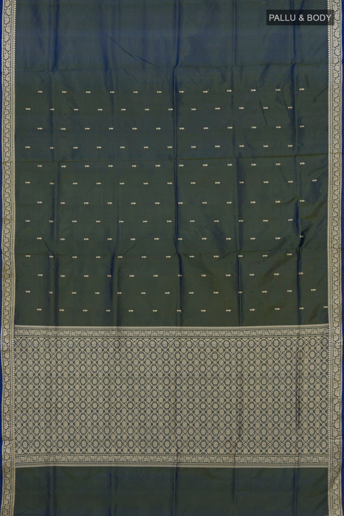 Flat view of Pure Silk Blue with Green Color Banarasi Katan Saree with Thread Butta on the body and Thread Border. 