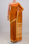 Pure Silk Mustard Banarasi Katan Saree with Thread Butta on the body and Thread Border.  displayed on a mannequin