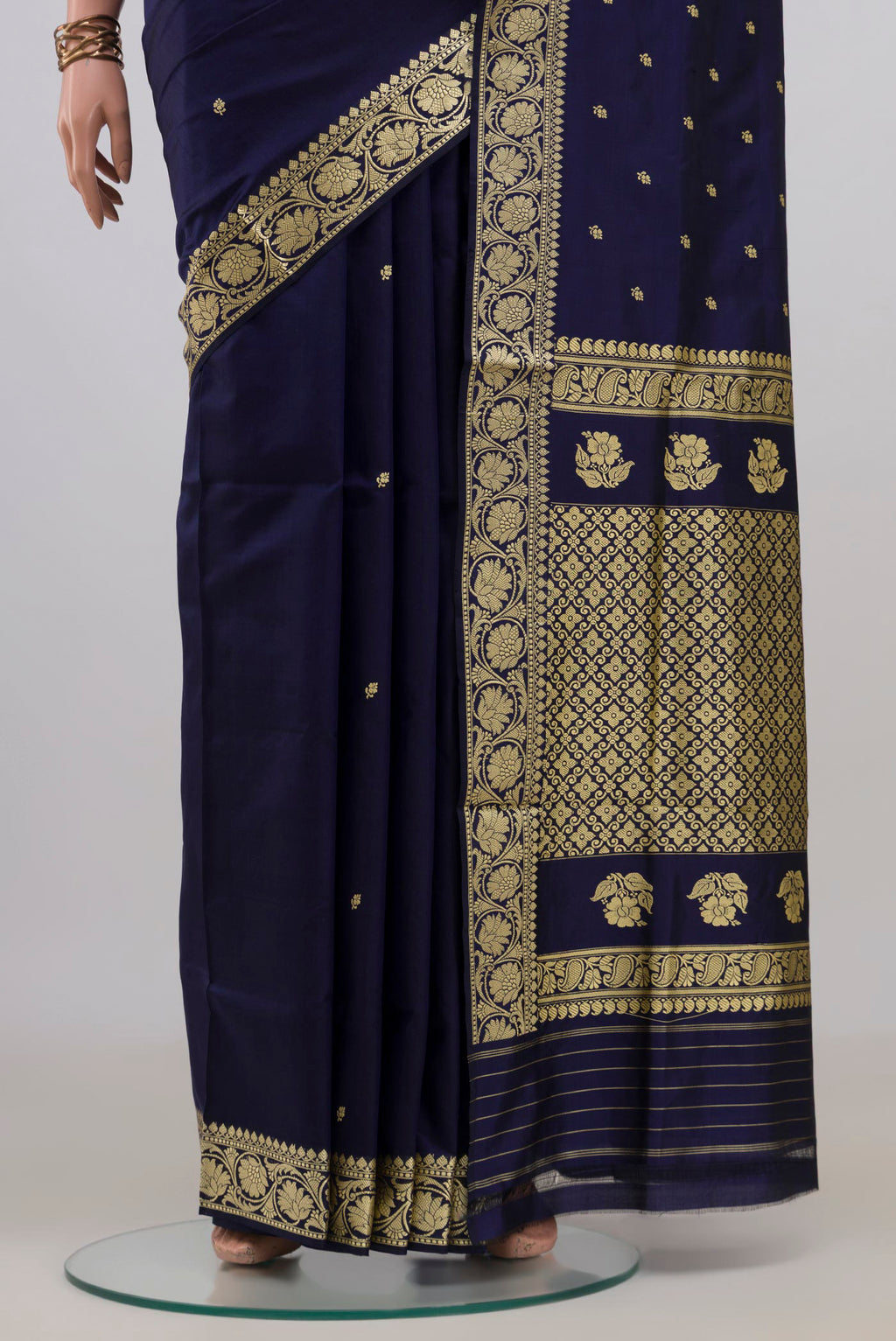 Pleats and pallu of Pure Silk Navy Blue Banarasi Katan Saree with Thread Butta on the body and Thread Border. 