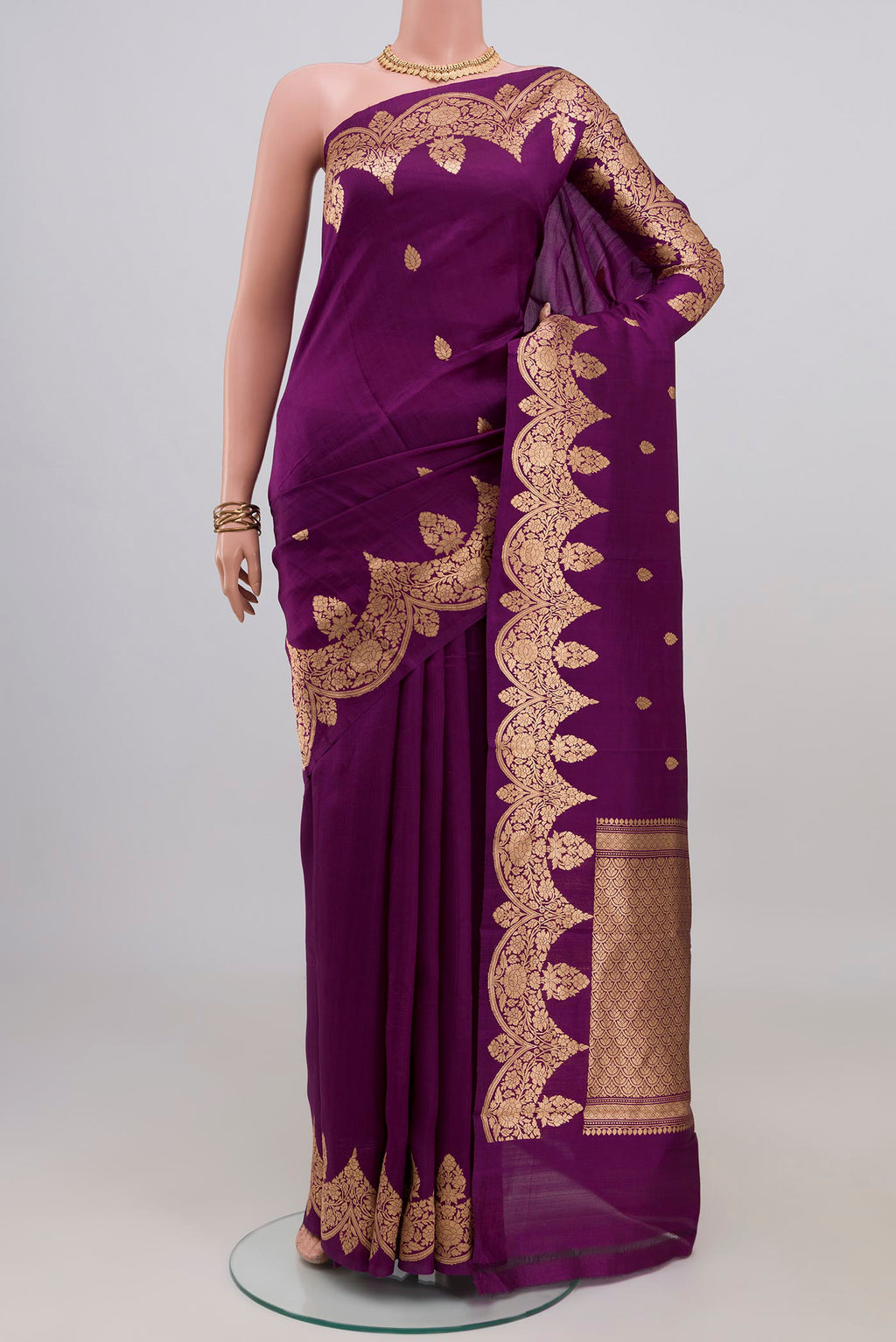 Purple Banarasi Katan Silk Saree with Zari Butta on the body and Fancy Border.  displayed on a mannequin