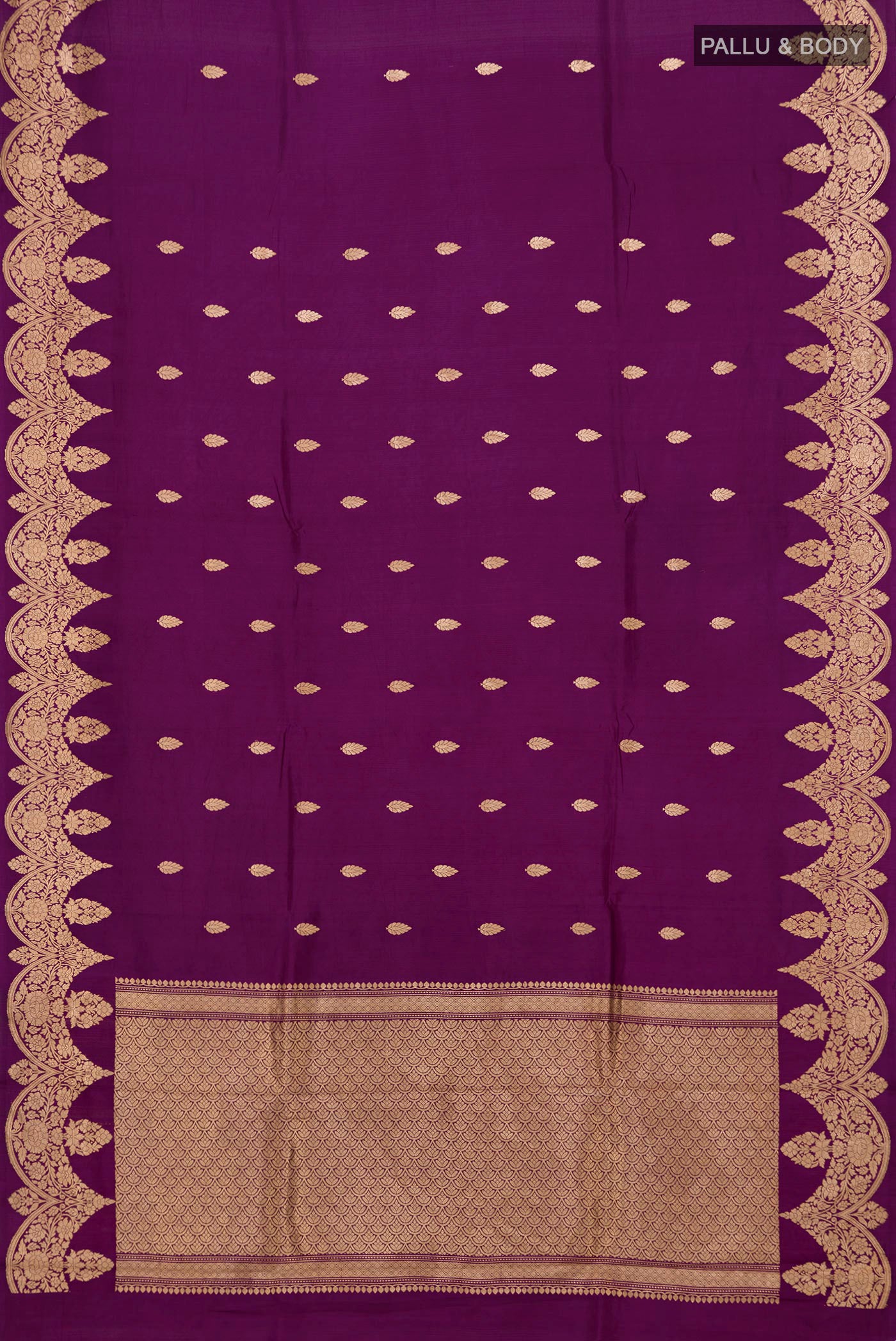 Flat view of Purple Banarasi Katan Silk Saree with Zari Butta on the body and Fancy Border. 