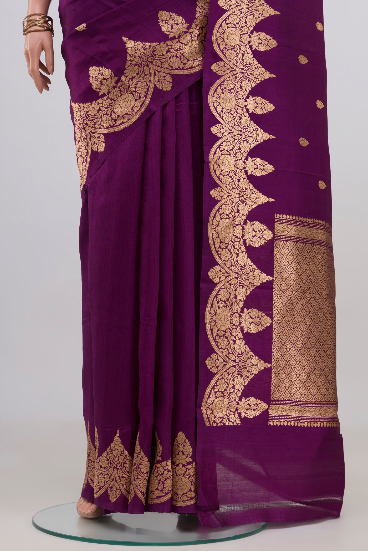 Pleats and pallu of Purple Banarasi Katan Silk Saree with Zari Butta on the body and Fancy Border. 