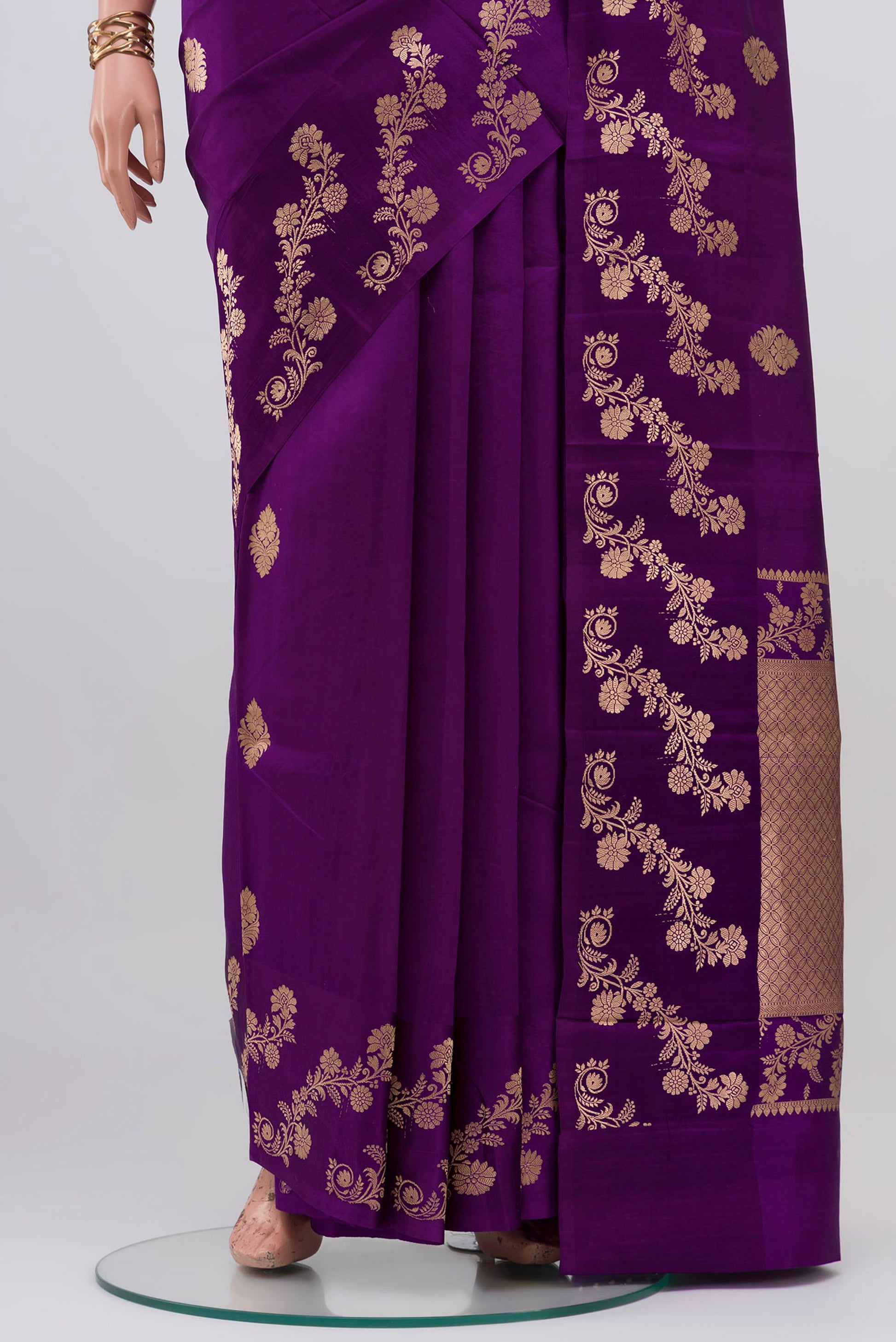 Pleats and pallu of Violet Banarasi Katan Silk Saree with Zari Butta on the body and Fancy Border. 