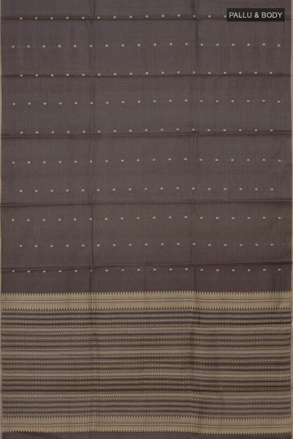 Flat view of Grey Tussar Silk Saree with Thread Butta on the body and Without Border. 