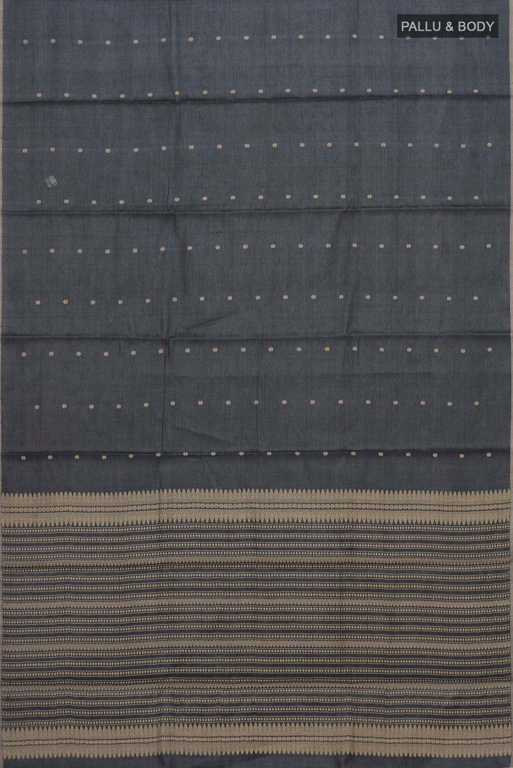 Flat view of Grey Tussar Silk Saree with Thread Butta on the body and Without Border. 