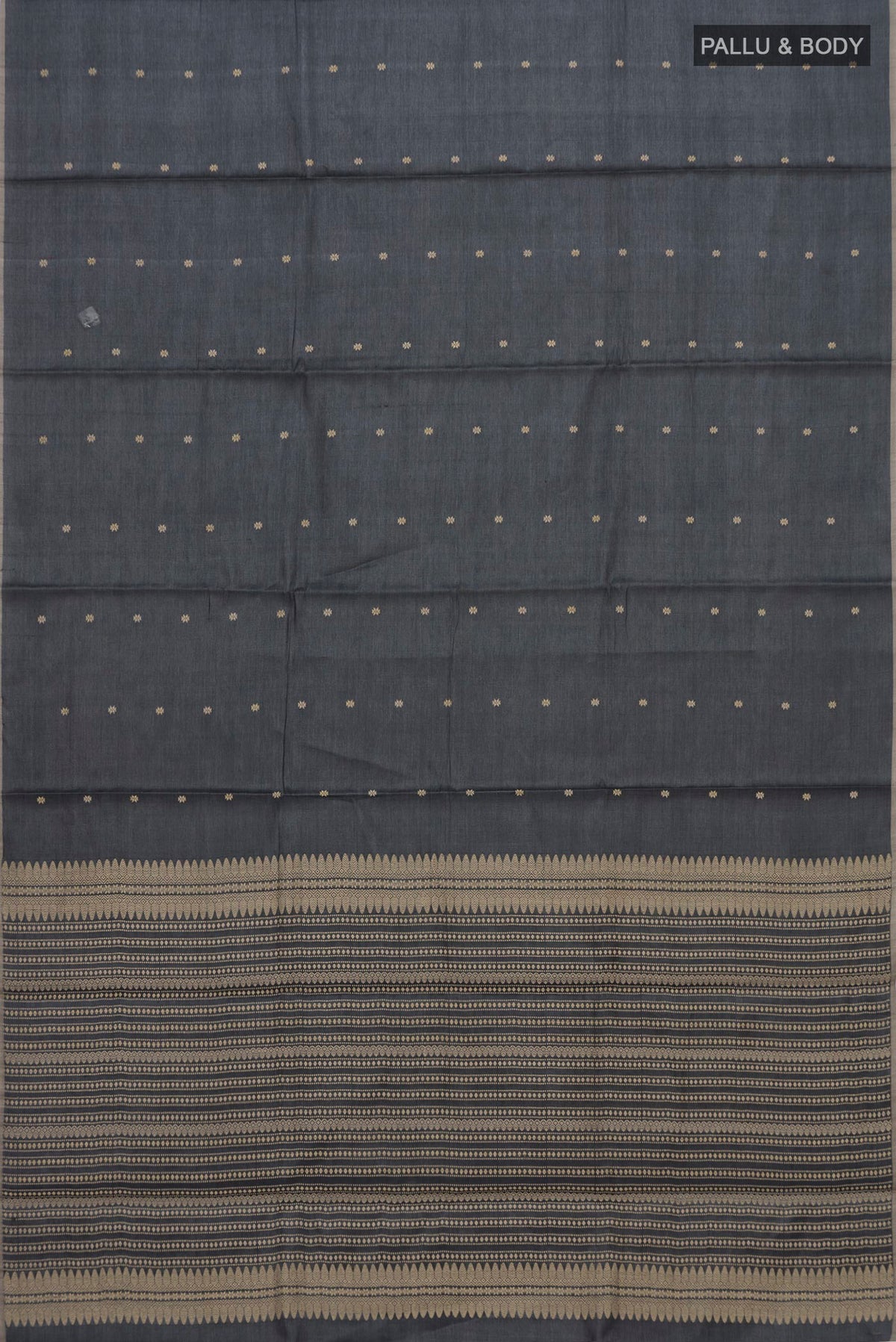 Flat view of Grey Tussar Silk Saree with Thread Butta on the body and Without Border. 