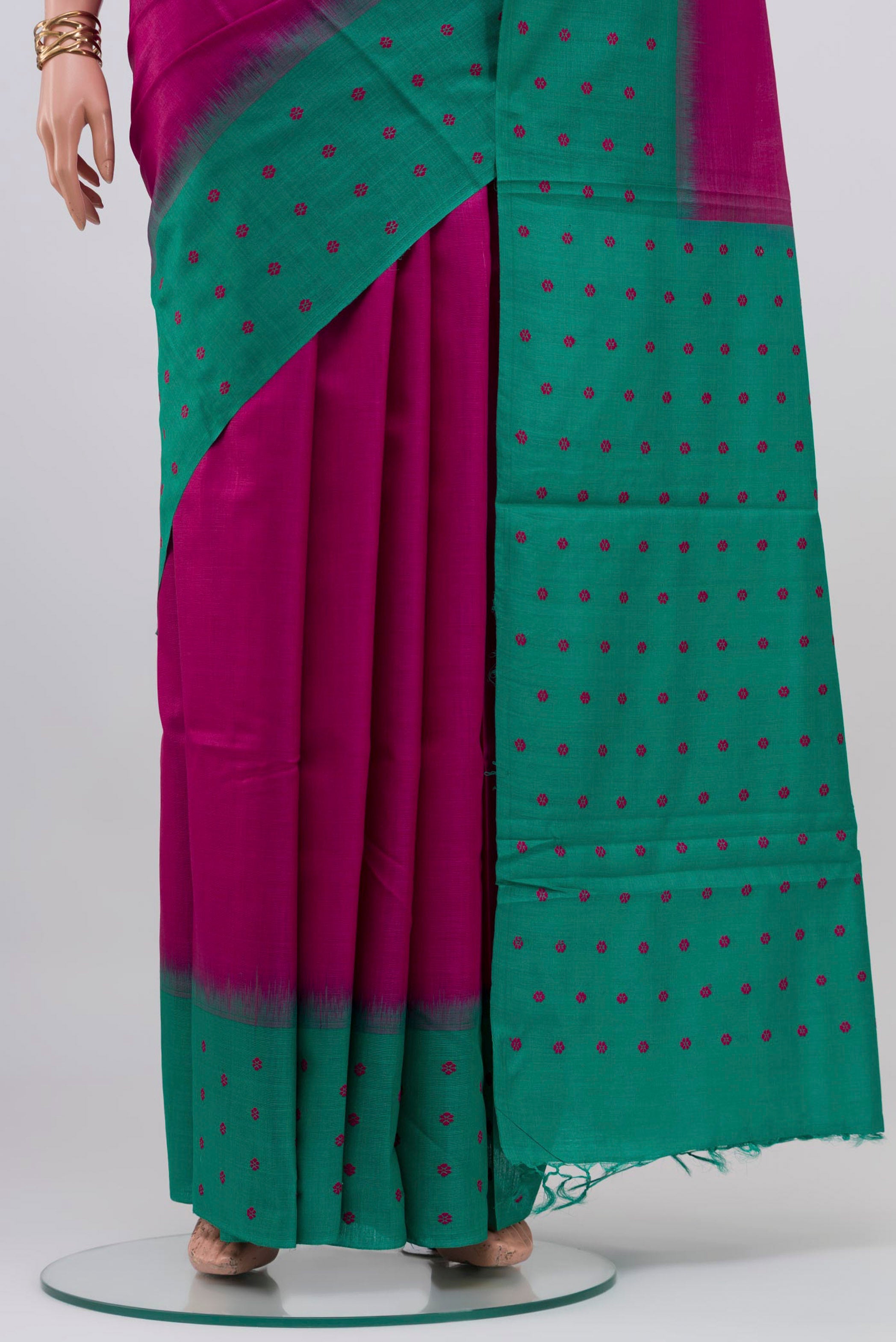 Pleats and pallu of Magenta Tussar Silk Saree with Plain Body and Fancy Border. 