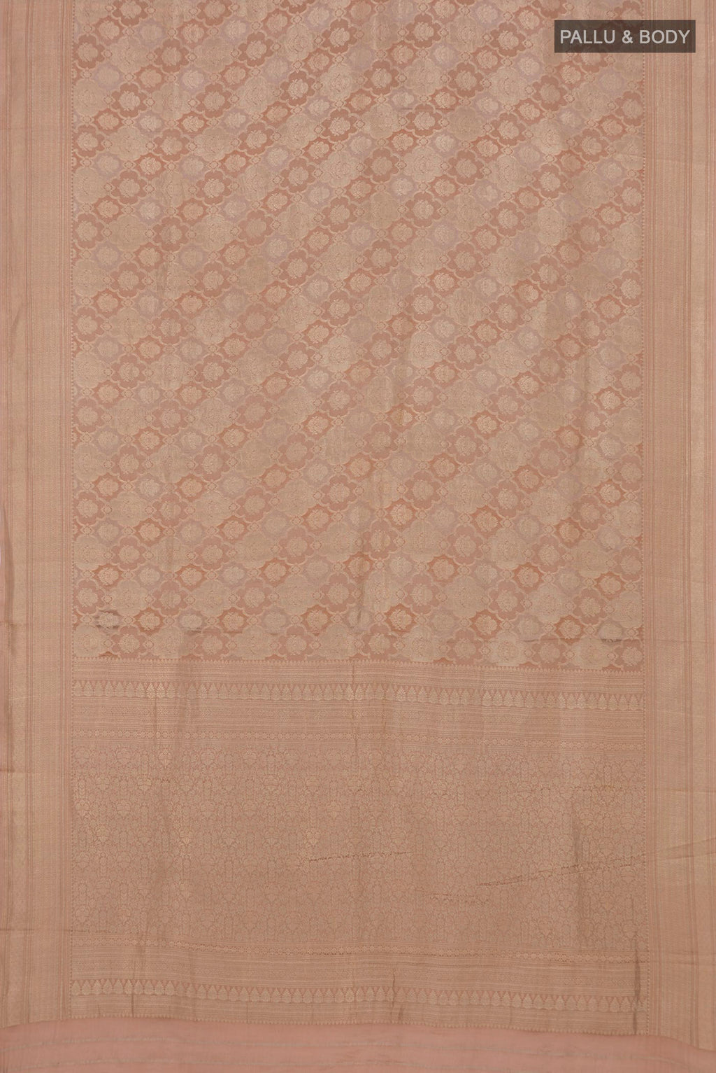 Flat view of Rose Gold Crepe Saree with Zari Brocade on the body and Zari Border. 