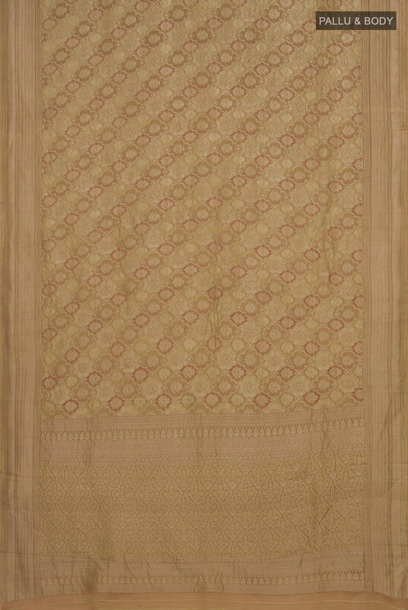 Flat view of Beige Mysore Crepe Saree with Zari Brocade on the body and Zari Border. 