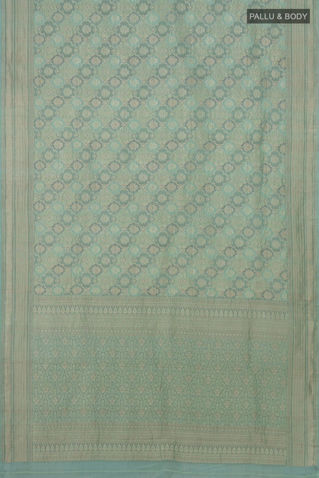 Flat view of Blue Grey Mysore Crepe Saree with Zari Brocade on the body and Zari Border. 