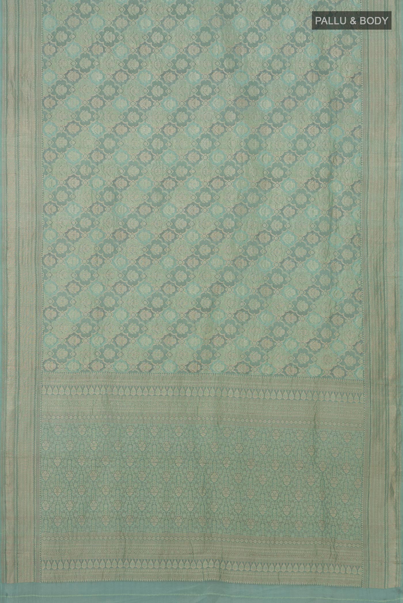 Flat view of Blue Grey Mysore Crepe Saree with Zari Brocade on the body and Zari Border. 