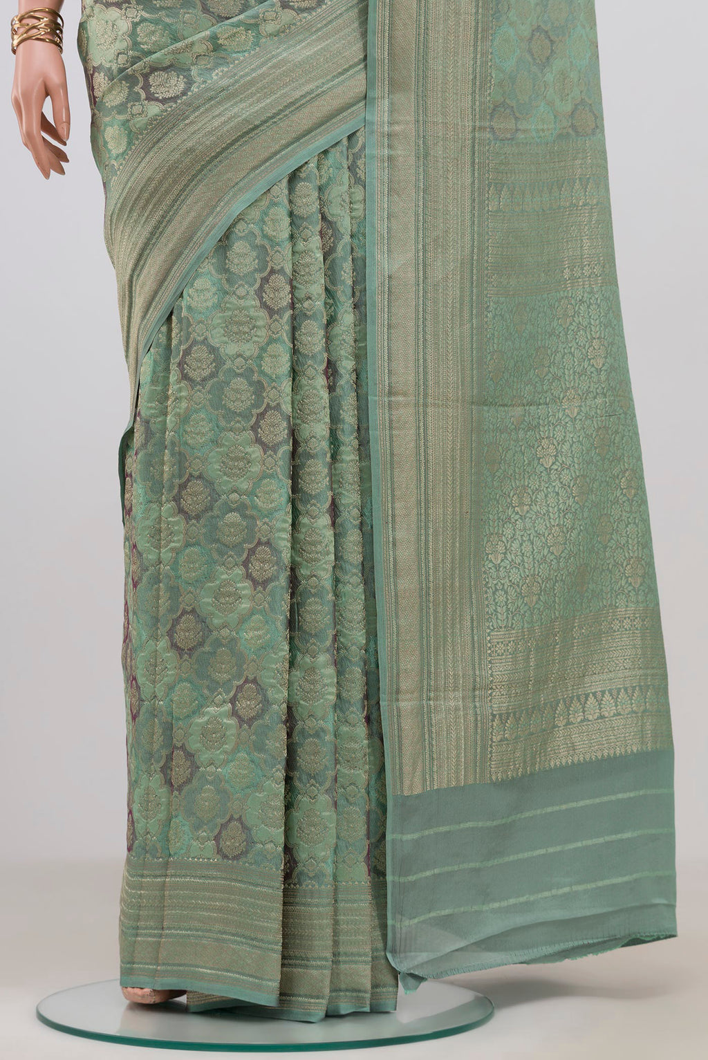 Pleats and pallu of Blue Grey Mysore Crepe Saree with Zari Brocade on the body and Zari Border. 
