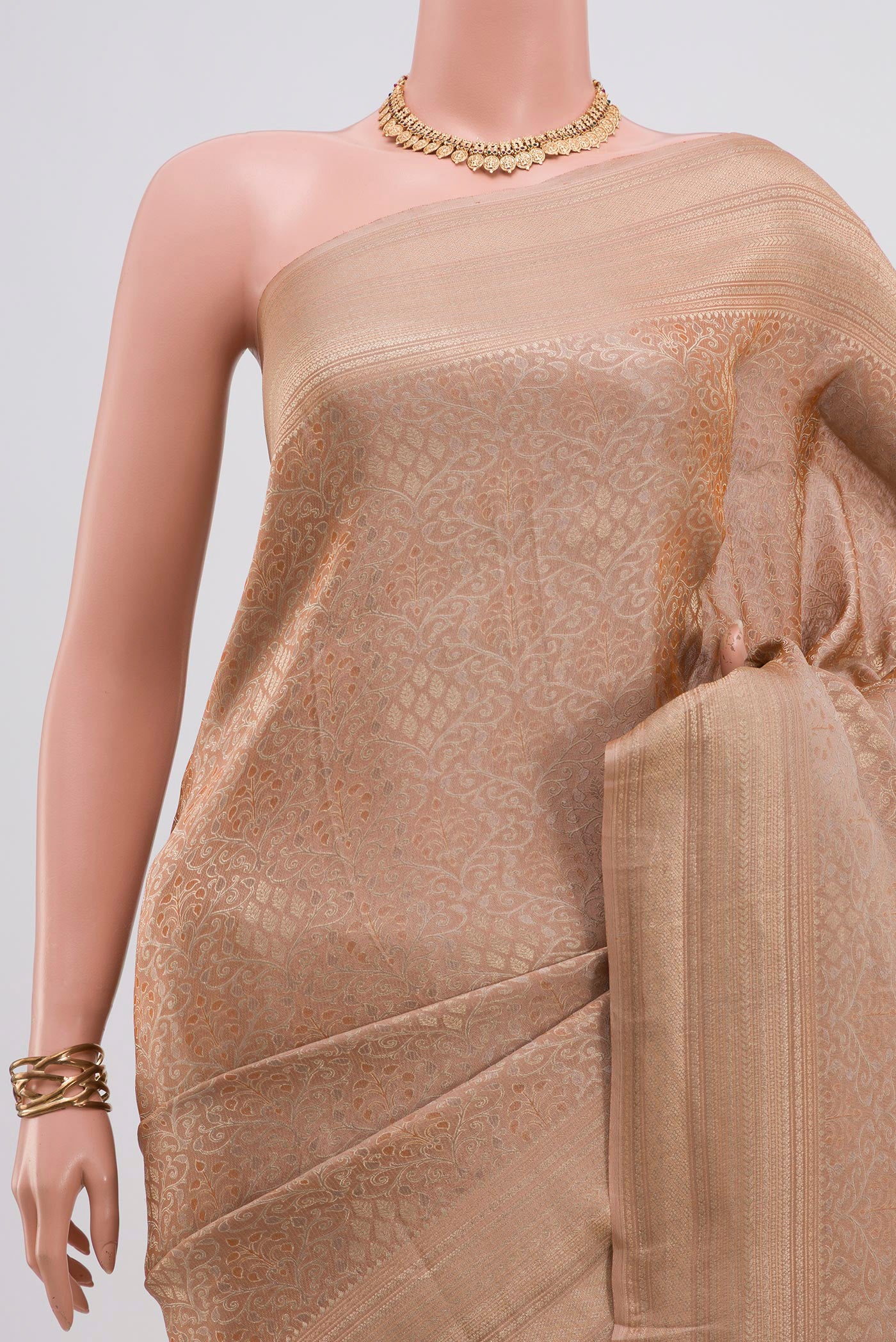 Border image of Beige Crepe Saree with Fancy on the body and Fancy Border. 