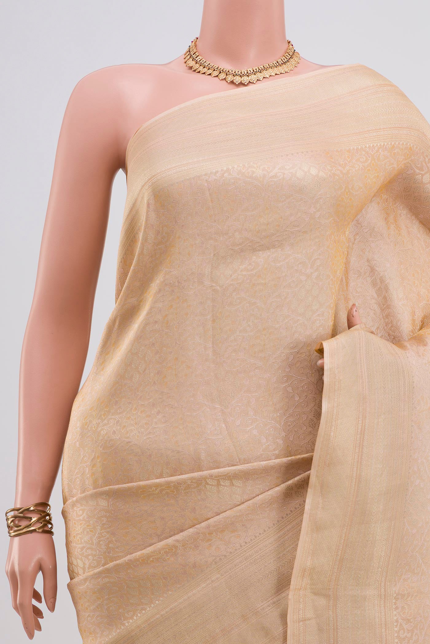 Border image of Beige Crepe Saree with Fancy on the body and Fancy Border. 