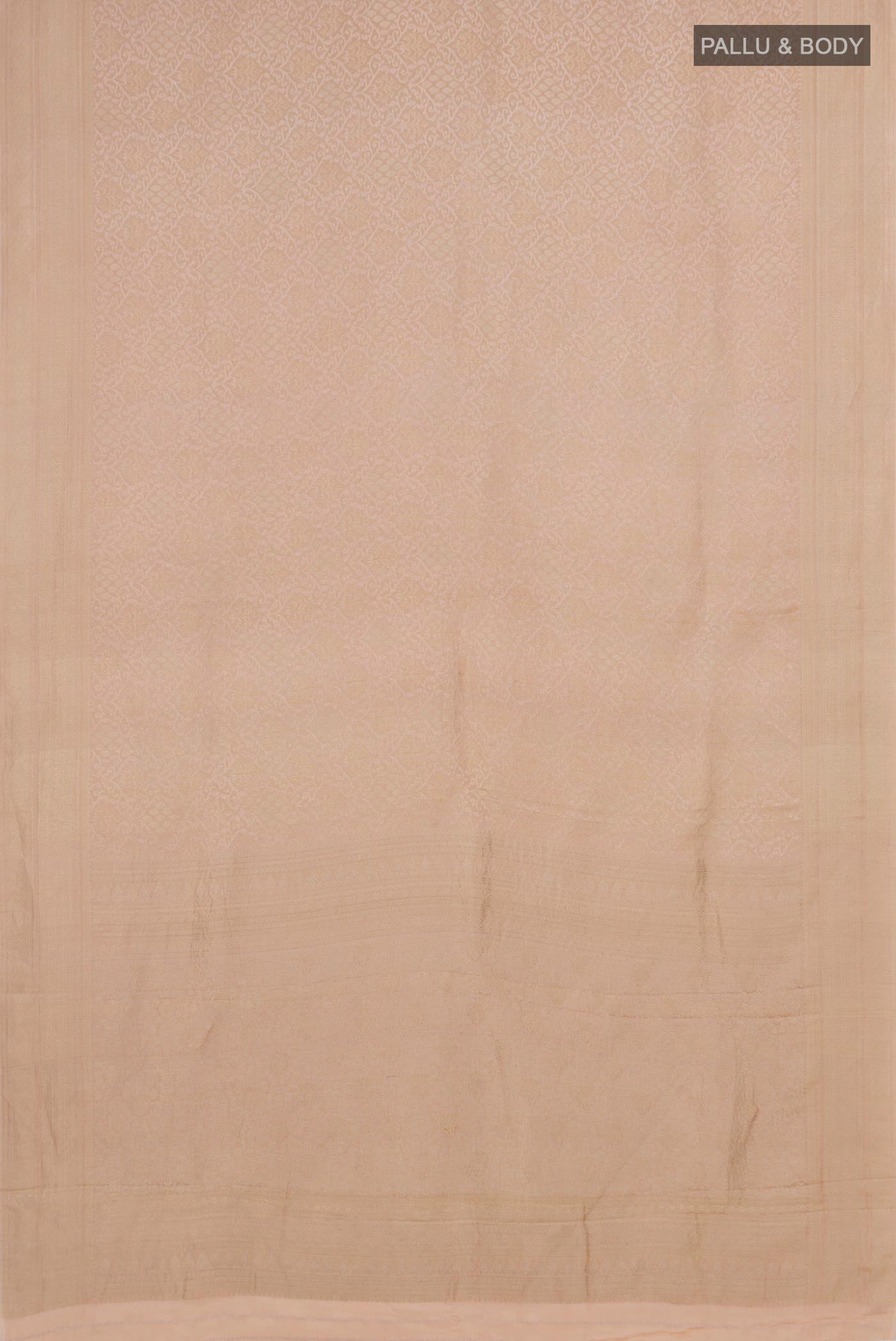 Flat view of Beige Crepe Saree with Fancy on the body and Fancy Border. 