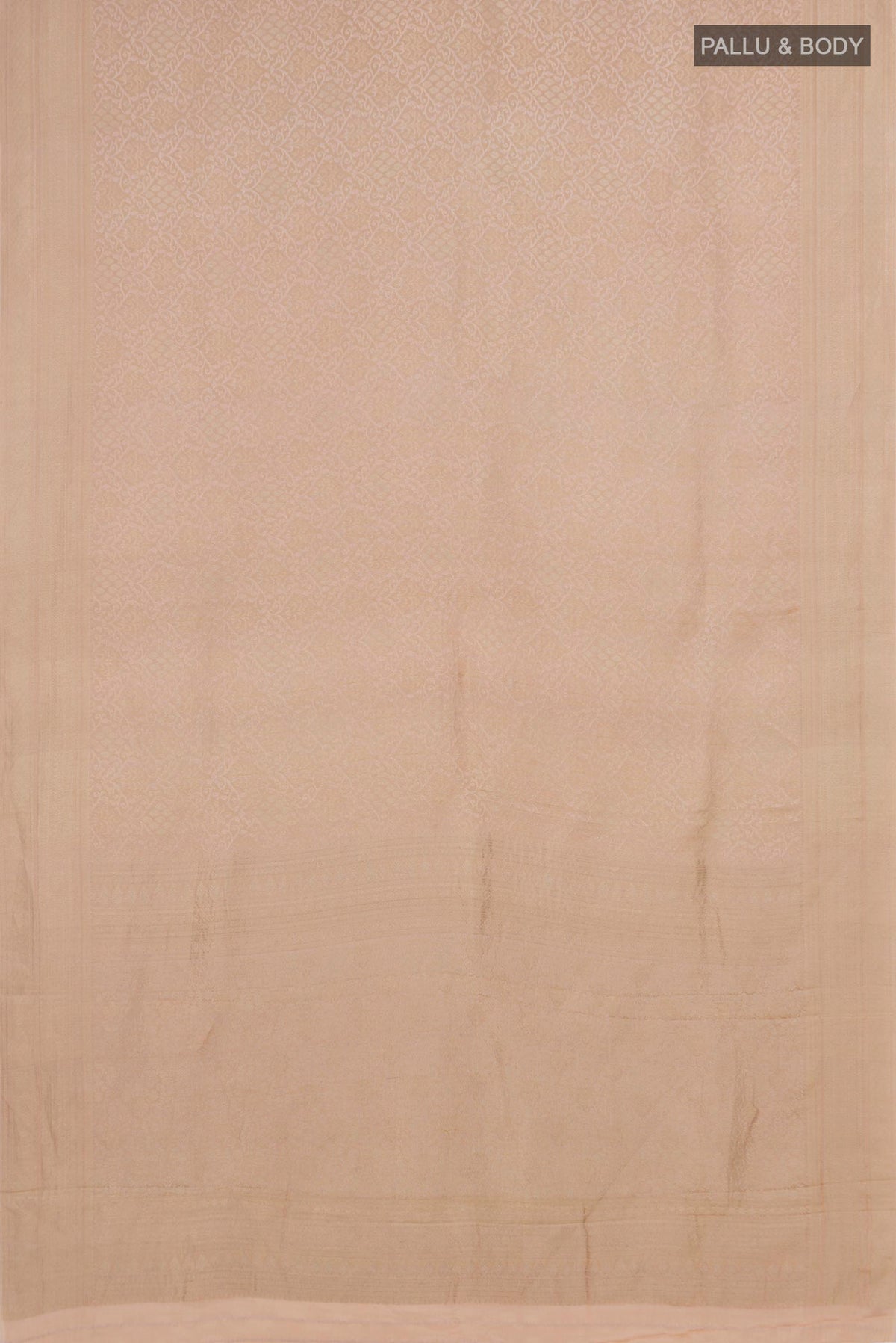 Flat view of Beige Crepe Saree with Fancy on the body and Fancy Border. 