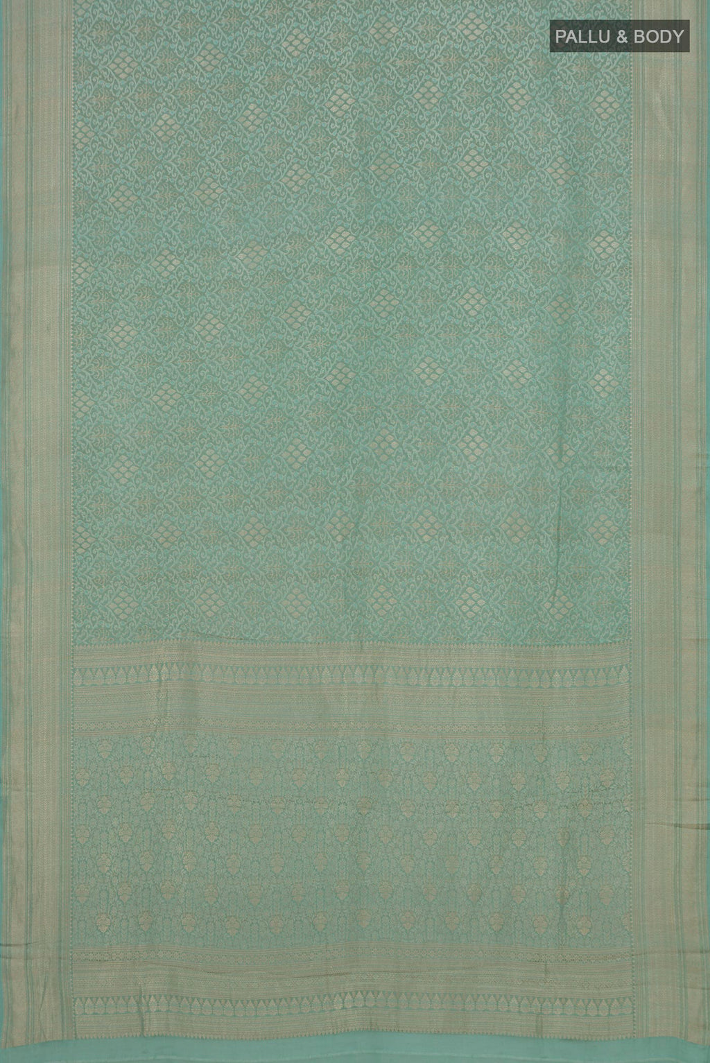 Flat view of Light Blue Crepe Saree with Zari Brocade on the body and Fancy Border. 