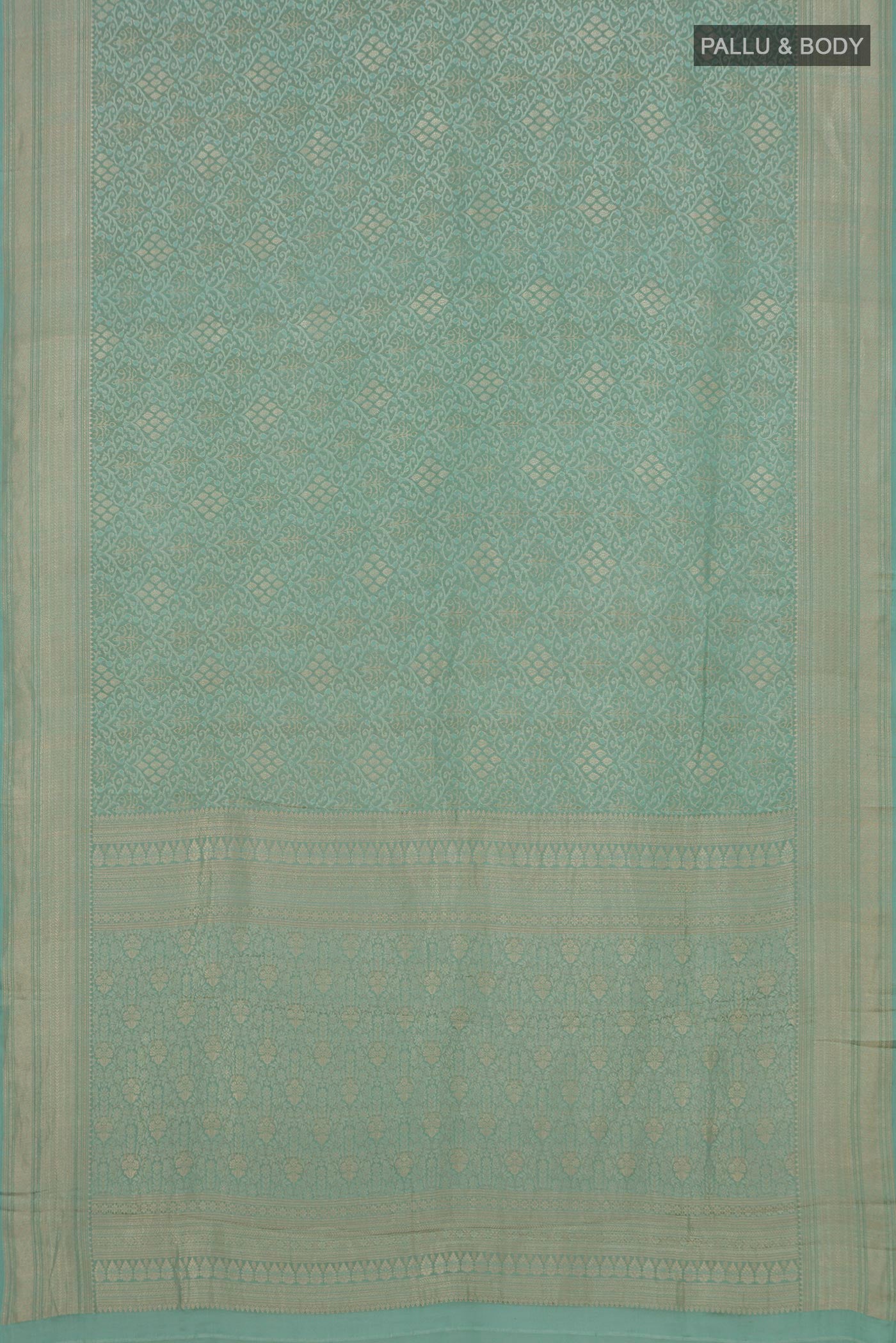 Flat view of Light Blue Crepe Saree with Zari Brocade on the body and Fancy Border. 