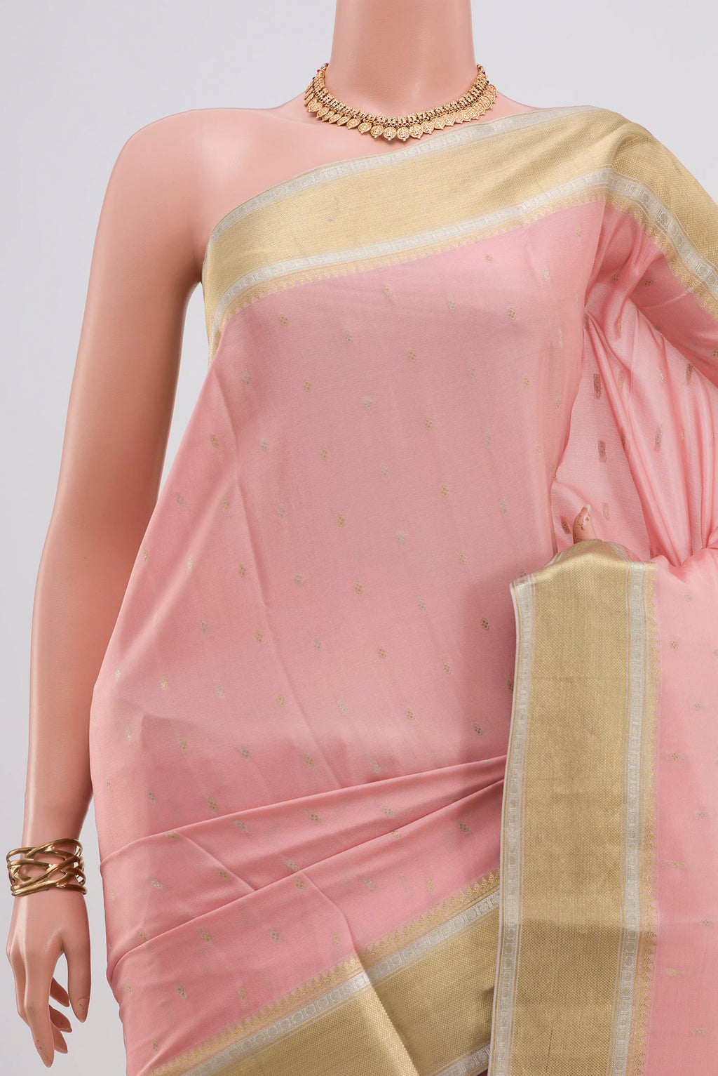 Border image of Pink Crepe Saree with Fancy on the body and Zari Border. 