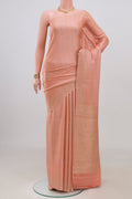 Peach Mysore Crepe Saree with Stripes on the body and Without Border.  displayed on a mannequin