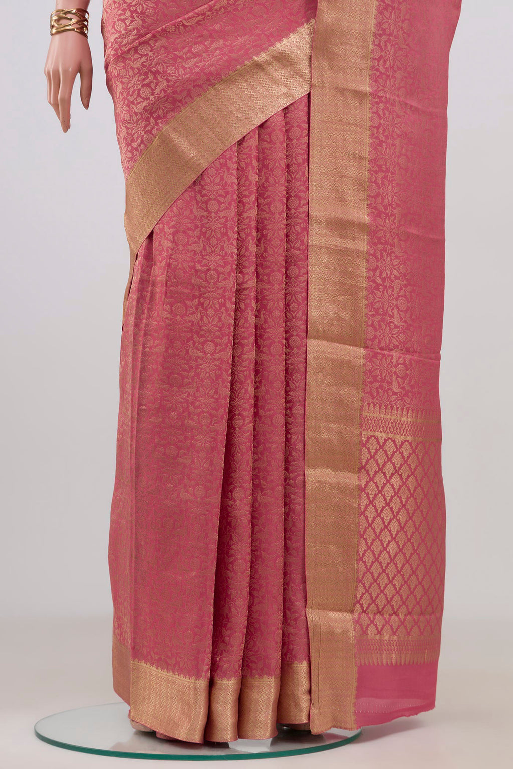 Pleats and pallu of Pink Mysore Crepe Saree with Zari Brocade on the body and Zari Border. 
