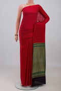Red Mysore Crepe Saree with Zari Butta on the body and Without Border.  displayed on a mannequin