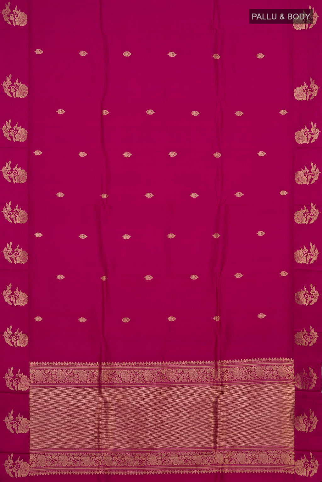 Flat view of Magenta Banarasi Katan Silk Saree with Zari Butta on the body and Fancy Border. 