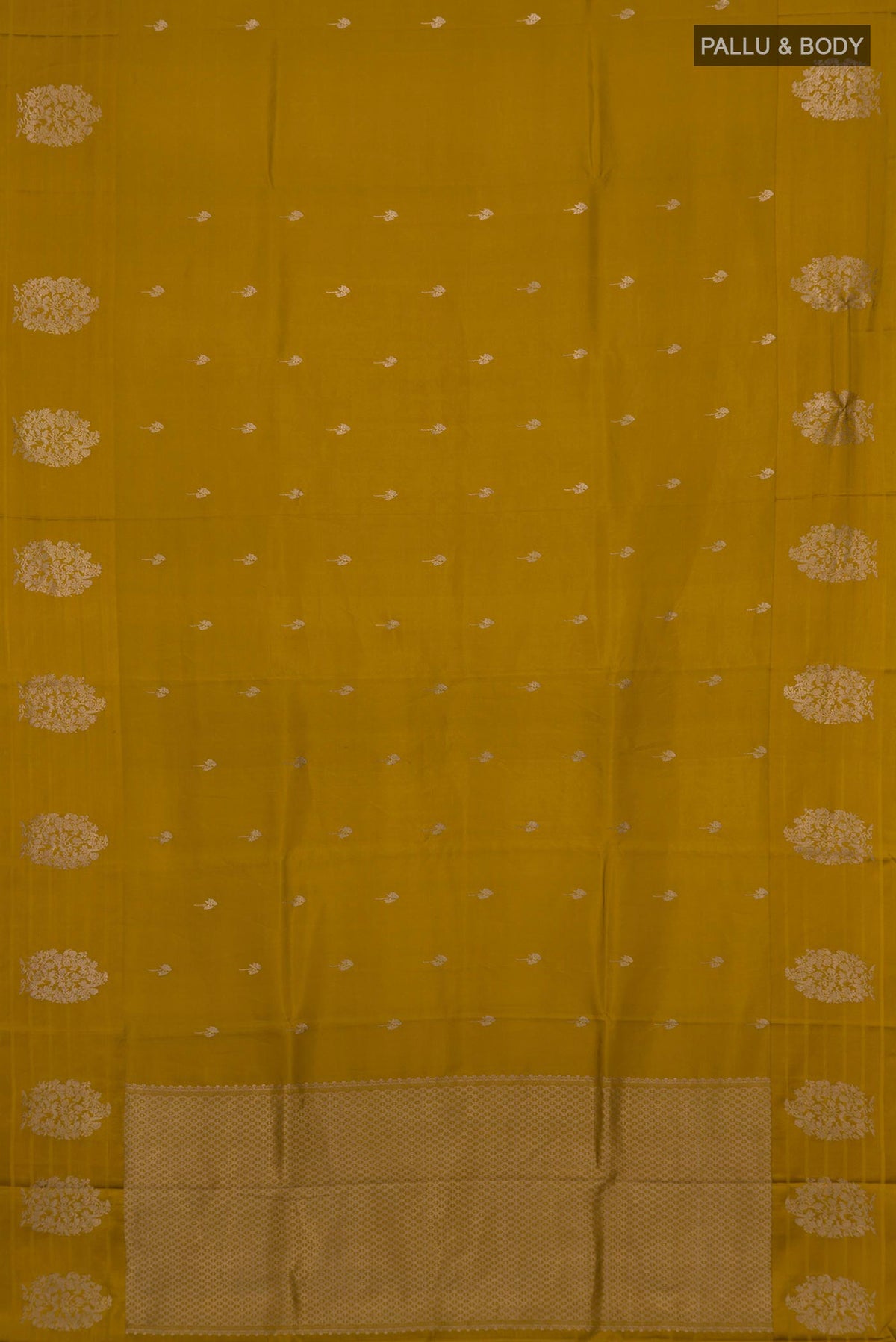 Flat view of Pure Silk Mustard Banarasi Katan Saree with Zari Butta on the body and Fancy Border. 