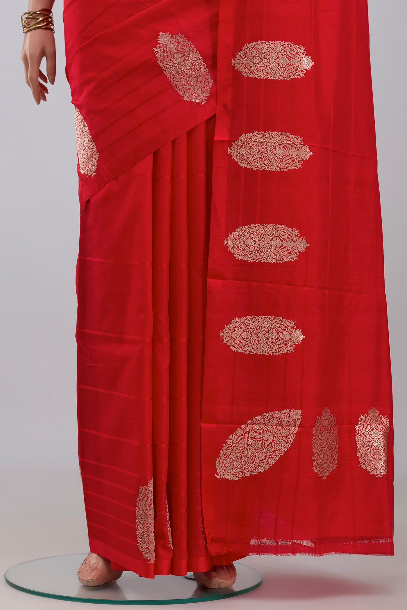 Pleats and pallu of Red Banarasi Katan Silk Saree with Plain Body and Fancy Border. 