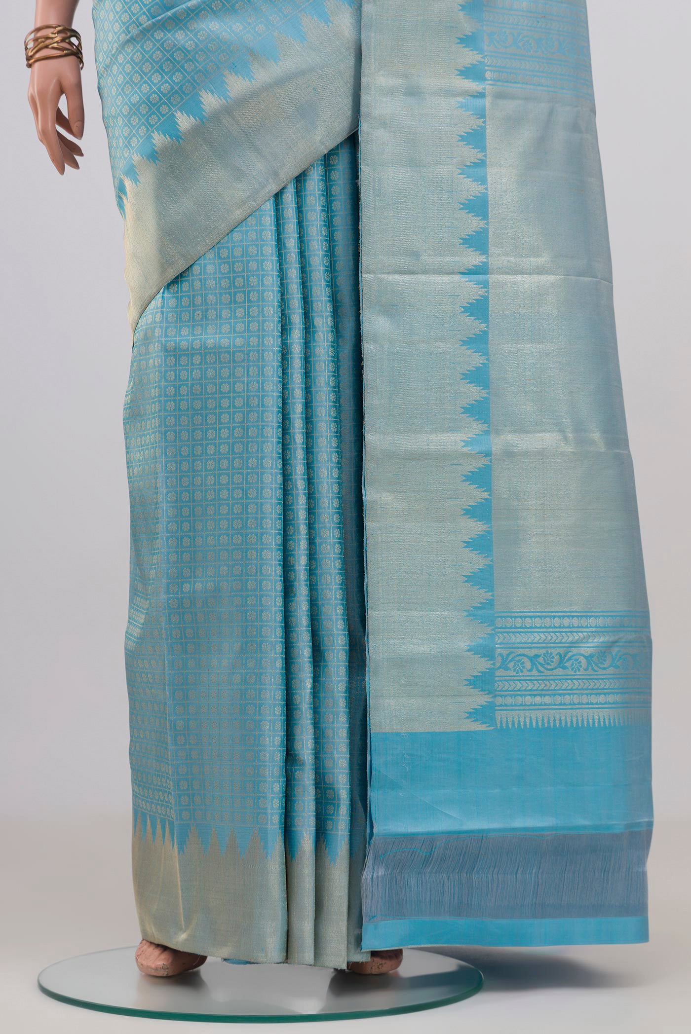 Pleats and pallu of Sky Blue Kanchipuram Silk Saree with Zari Brocade on the body and Temple Border. 