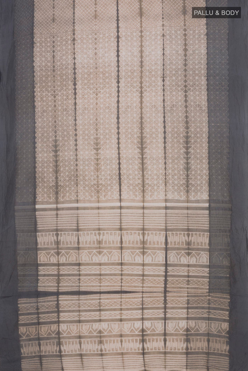 Flat view of Beige Tussar Silk Saree with Printed design on the body and Plain Border. 
