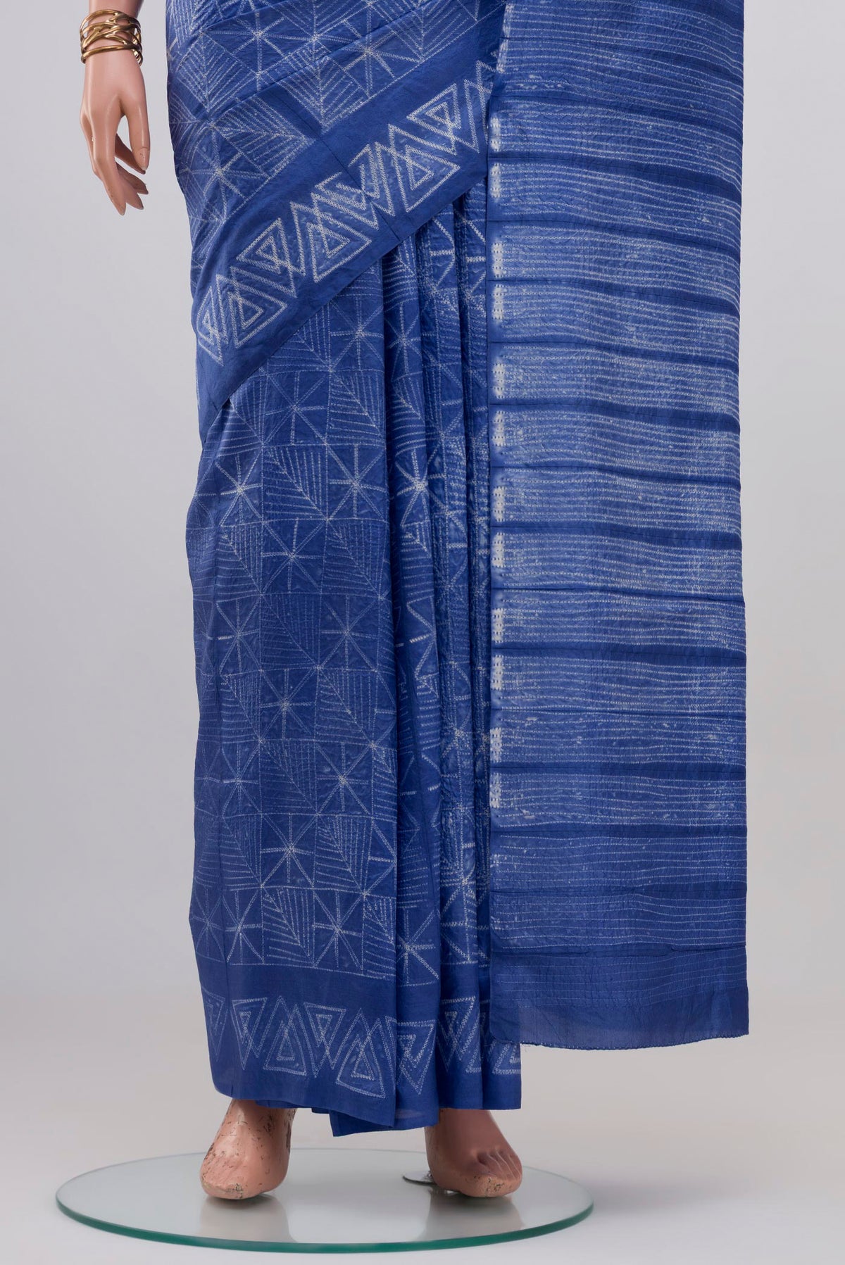 Pleats and pallu of Royal Blue Tussar Silk Saree with Printed design on the body and Printed Border. 