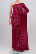 Maroon Tussar Silk Saree with Printed design on the body and Printed Border.  displayed on a mannequin