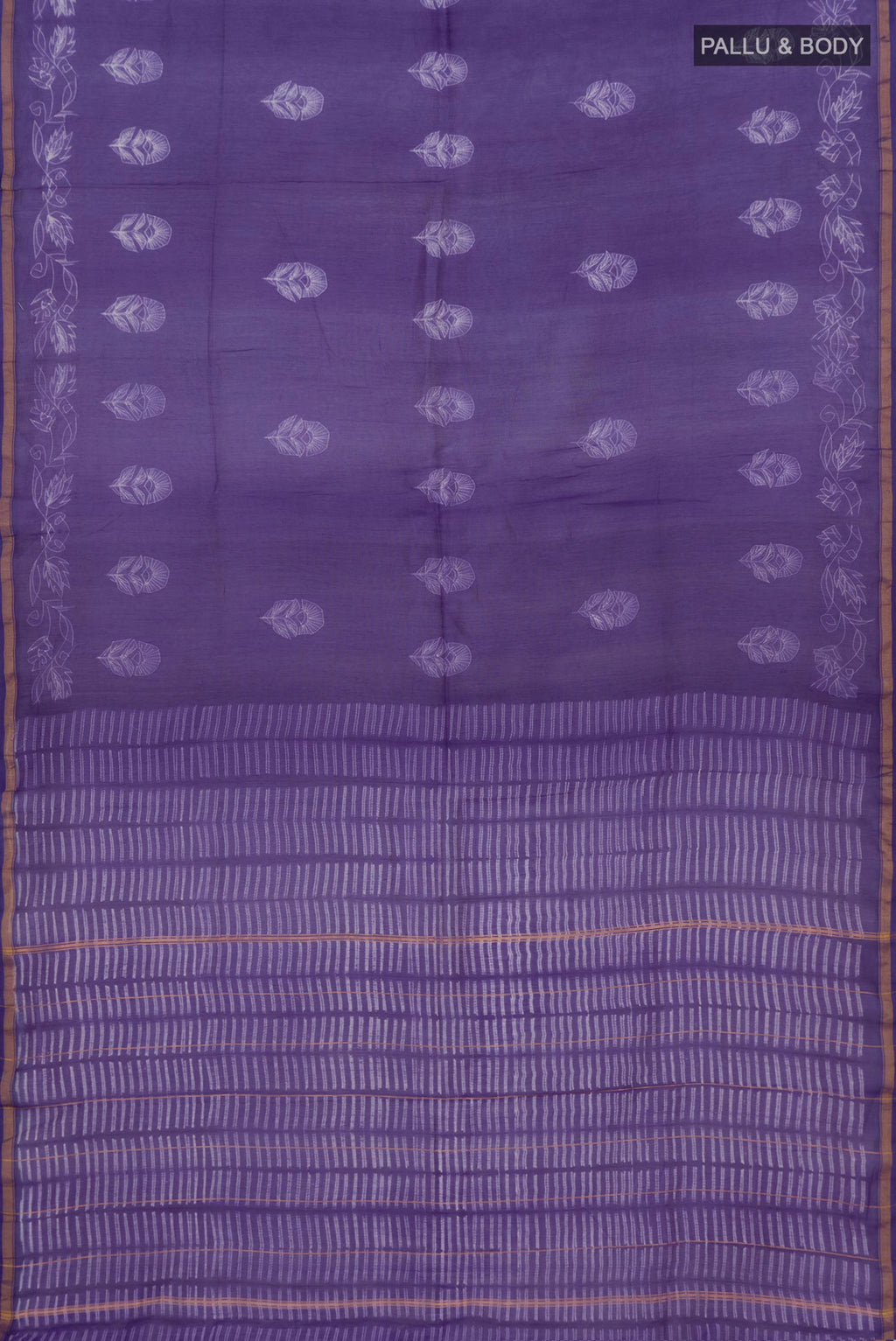 Flat view of Violet Chanderi Silk Cotton Saree with Printed design on the body and Thin Zari Line. 