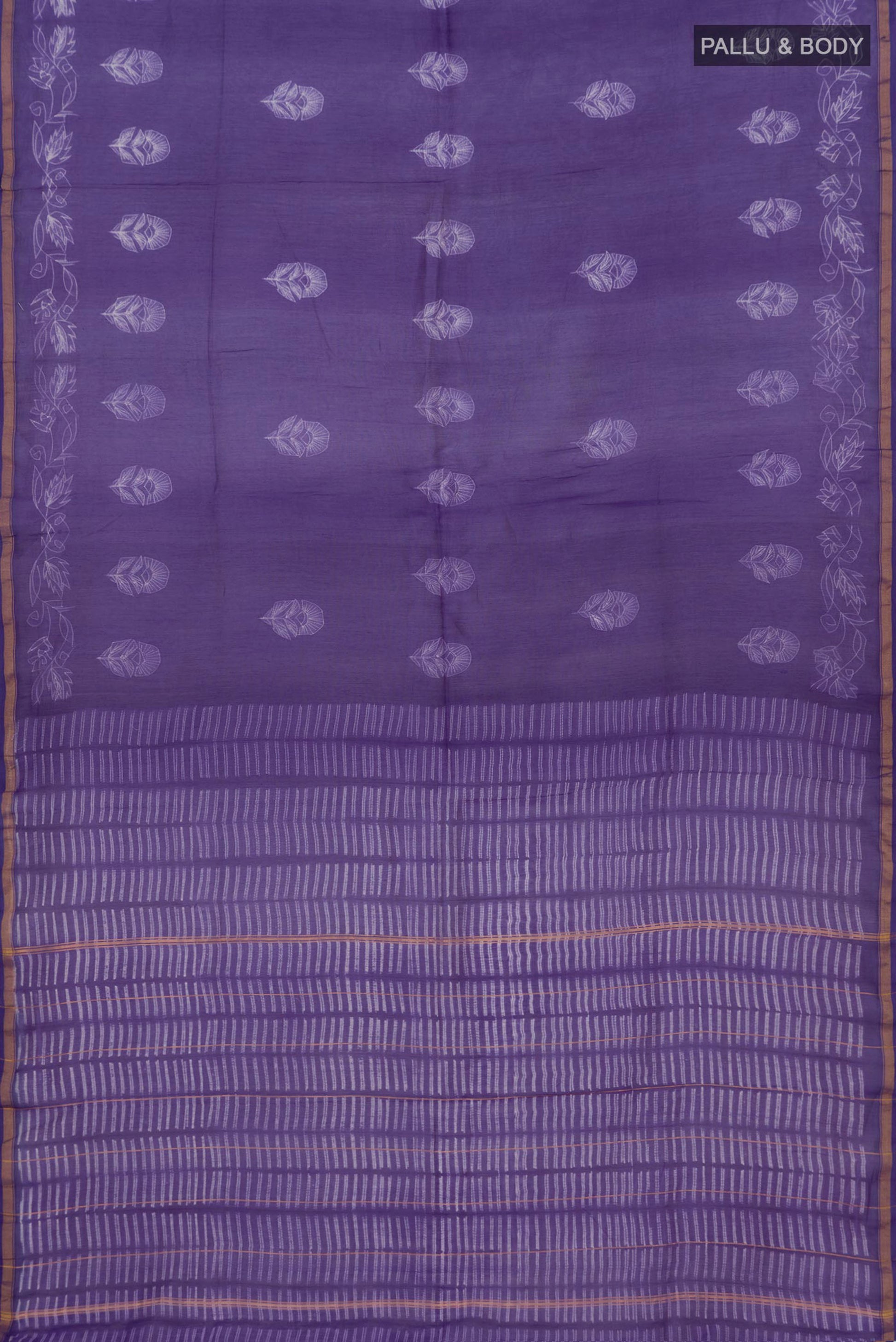 Flat view of Violet Chanderi Silk Cotton Saree with Printed design on the body and Thin Zari Line. 