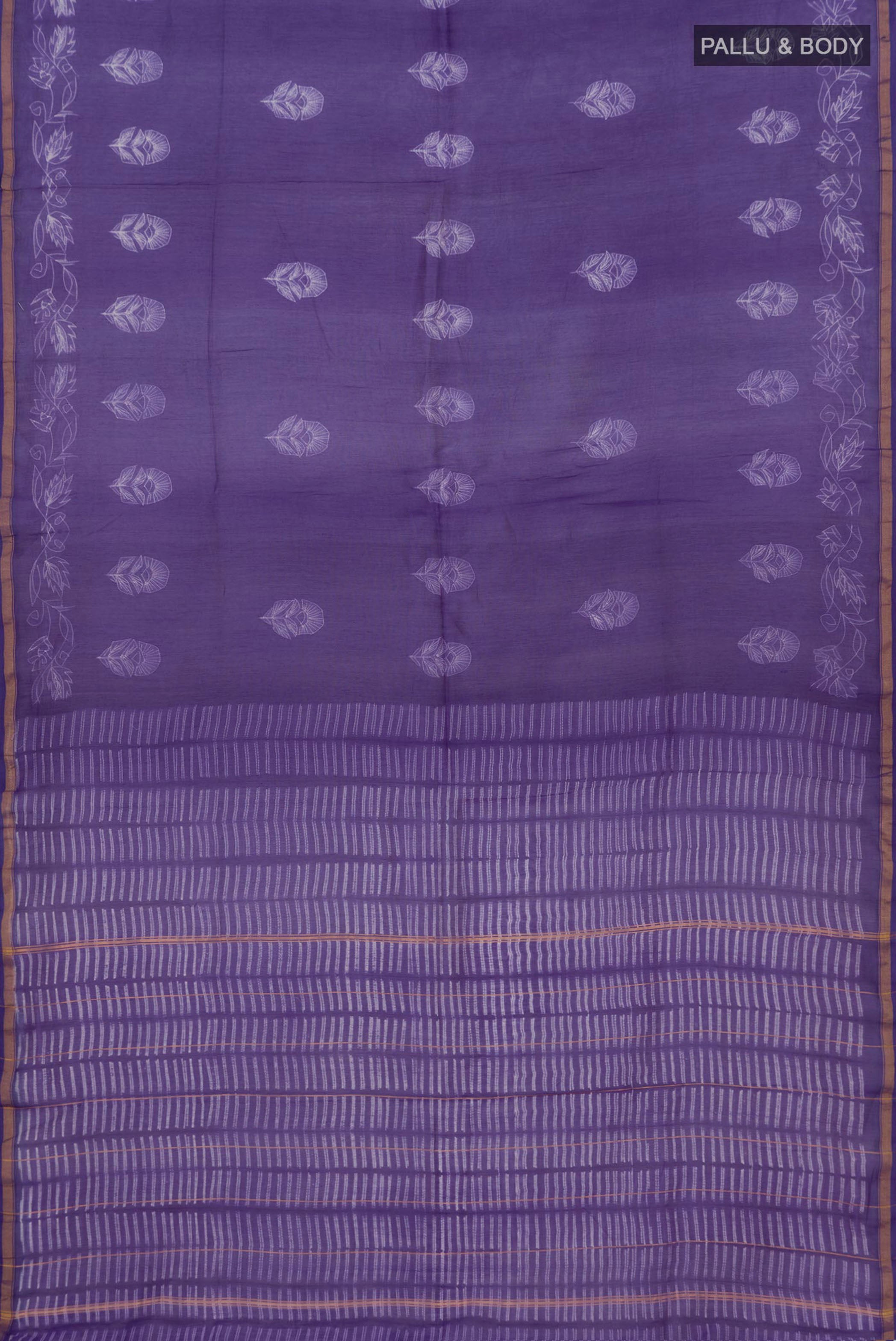 Flat view of Violet Chanderi Silk Cotton Saree with Printed design on the body and Thin Zari Line. 