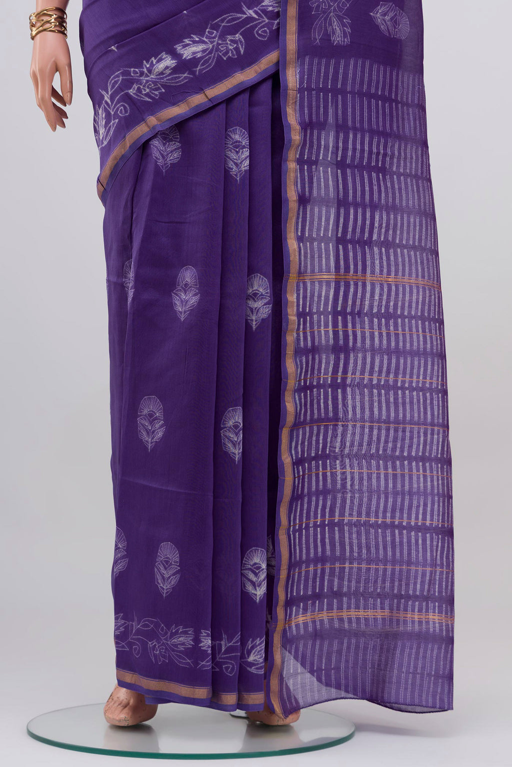 Pleats and pallu of Violet Chanderi Silk Cotton Saree with Printed design on the body and Thin Zari Line. 